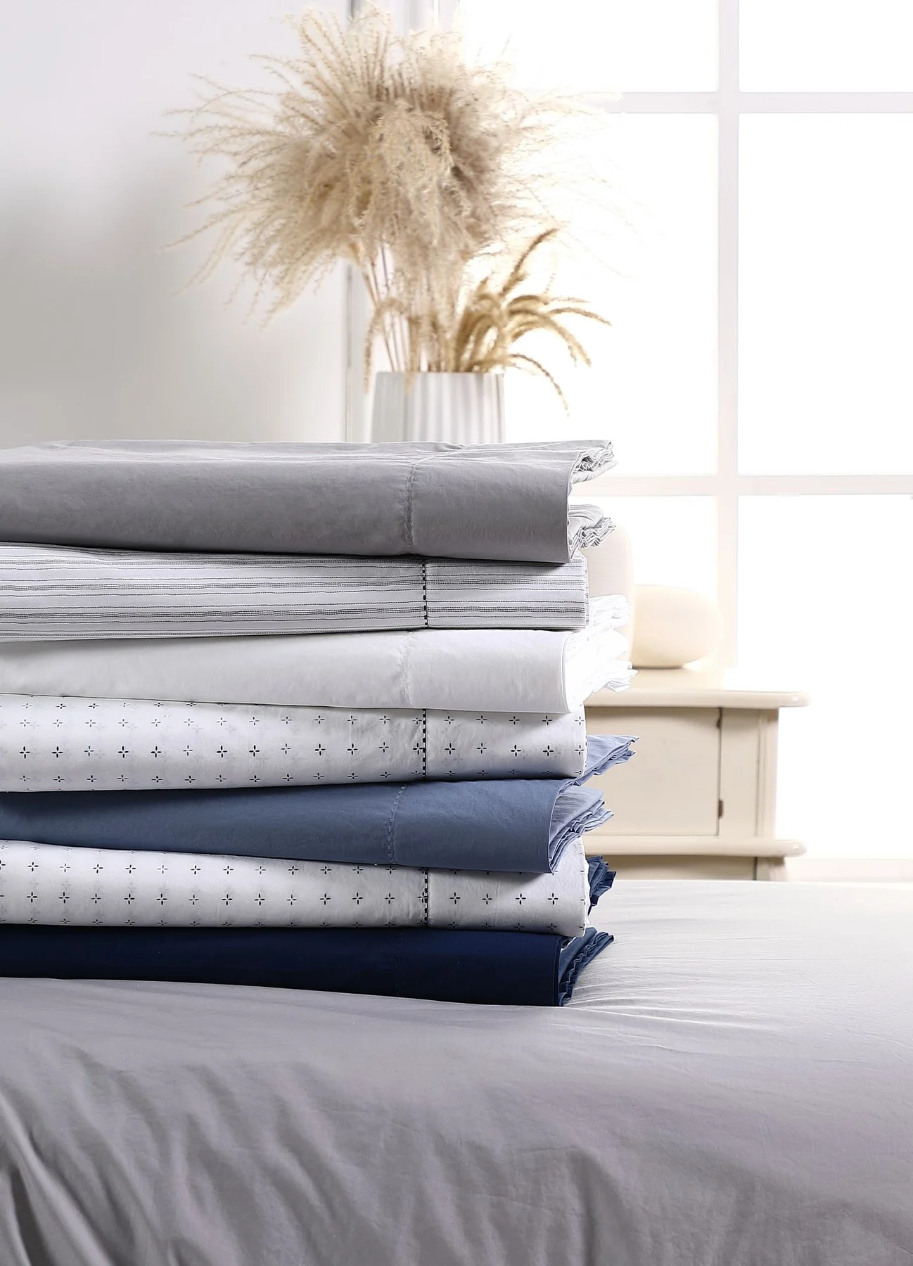 Close-up of folded bedding textiles and material details
